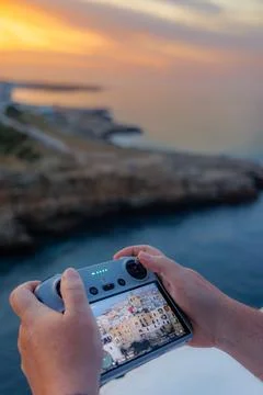 Sunset Drone Operation: Capturing Vacation Memories Stock Photos
