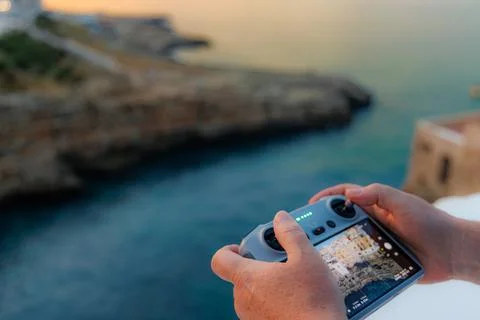 Sunset Drone Operation: Capturing Vacation Memories Stock Photos