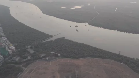 Sunset Drone Shot Over Mangroves and Waterways of Gorai Creek, Mumbai Stock Footage 307771689