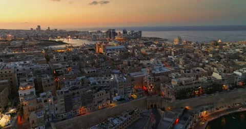 Sunset drone view of capital of Malta, Valletta city Stock Footage 316549778