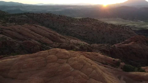Sunset drone view of drone flying over the desert in St. George, Utah. The Stock Footage 167057431