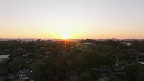 Sunset drone view of Khun Yuam village nestled in green hills, Thailand Stock Footage 309145937