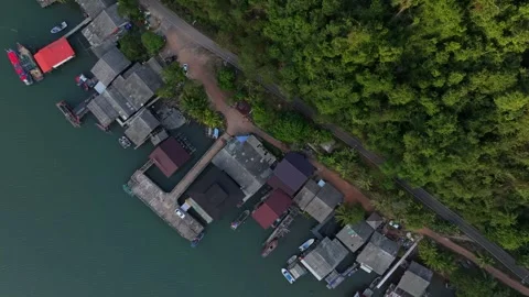 Sunset drone view over traditional stilt houses in Koh Chang, Thailand Stock Footage 310395530