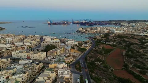 Sunset drone view of port and Birzebbuga city. Boats, marina. Maltese island Stock-Footage 278893569