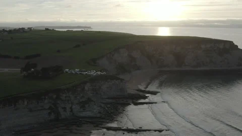 Sunset drone view of seagulls flying near ocean Cliffs in Spain 4K Stock Footage 137706262
