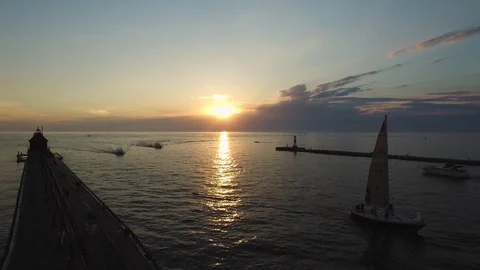 Sunset of Dual Lighthouses Grand Haven Lake Michigan Stock Footage