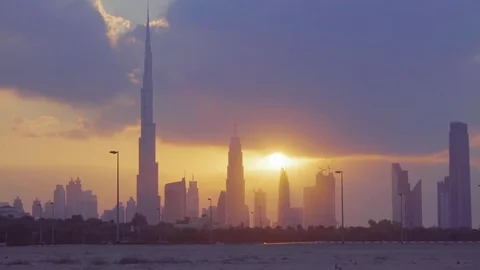 Sunset Dubai cityscape twilight skyline HD city timelapse video from desert Stock Footage 74729018