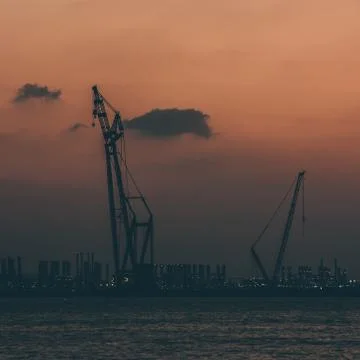 Sunset at the Dubai seaport, UAE Stock Photos