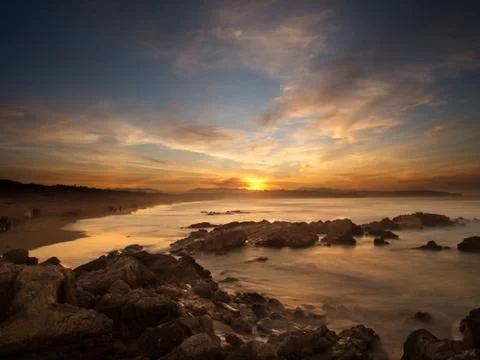Sunset in dunes of Liencres beach Stock Photos