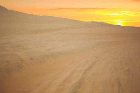 Sunset in the dunes. Stock Photos