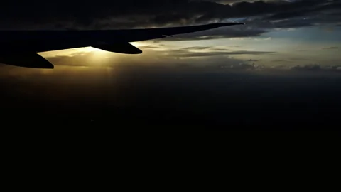 Sunset during flight Stock Footage 268696748
