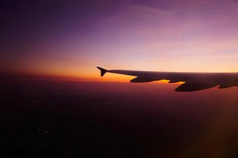 Sunset during flight Stockfoto's