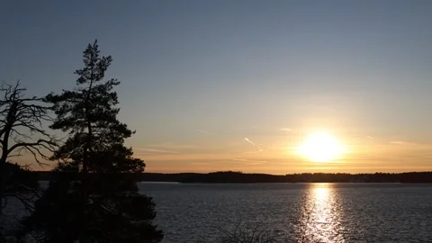 Sunset during the winter at a lake. Stock Footage 304630882