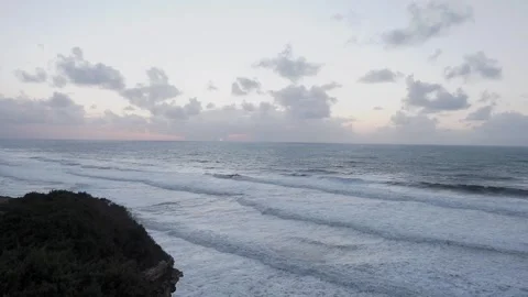 Sunset at dusk on the Atlantic Ocean, beautiful sky and waves in Portugal Stock Footage 259826802