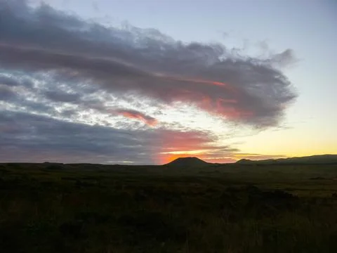 Sunset on Easter Island. The colors of sunset in ocean. Stock Photos