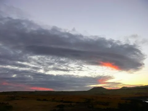 Sunset on Easter Island. The colors of sunset in ocean. Stock-Fotos