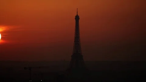 Sunset Eiffel tower Paris with sun close-up shot Stock Footage 82870017