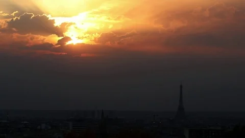 Sunset Eiffel tower Paris with sun and clouds Stock Footage 82870745