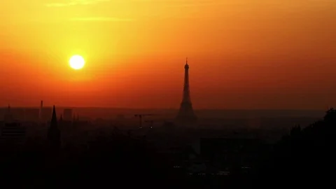 Sunset Eiffel tower Paris with sun Stock Footage 82870773