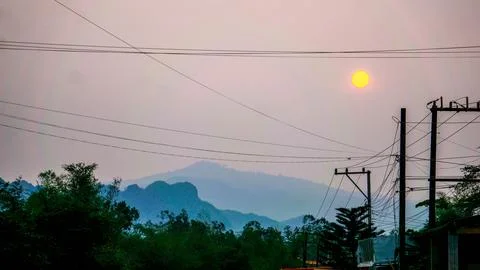 Sunset with electrical pole, Thakhek loop, Laos Stock Photos