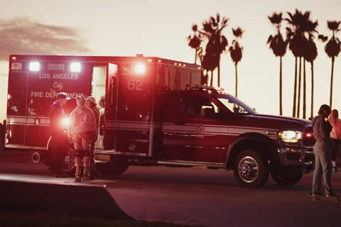Sunset Emergency Response on Venice Beach with Paramedics Video stock 297227155