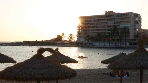 Sunset on the empty beach behind apartment building   in Can Pastilla Mallorca Video stock 81049256