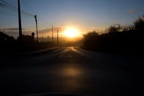 Sunset on an empty road in the countryside Фото