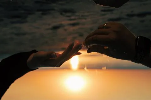 Sunset Engagement Ring Reflection on Mirror Stock Photos