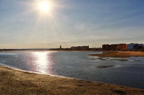 Sunset on the estuary of the river. Stock Photos