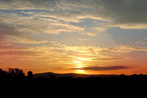 Sunset in evening beautiful dramatic sky with cloud, background light sky g.. Stock Photos