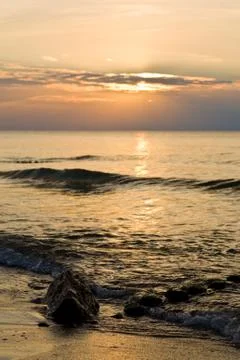 Sunset in the evening over the sea Stock Photos