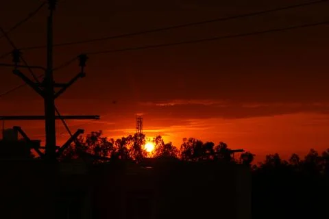 Sunset in evening with red sky Stock Photos