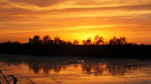 Sunset in fall over the Po River Delta Stock Photos