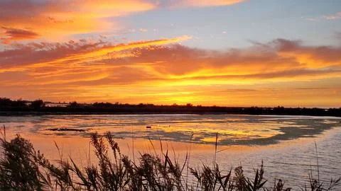 Sunset in fall over the Po River Delta Stock Photos