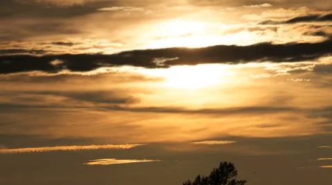 Sunset with fast moving clouds Stock Footage 42399186