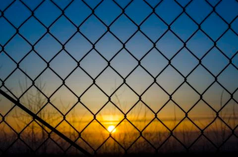 Sunset fence Stock-Fotos