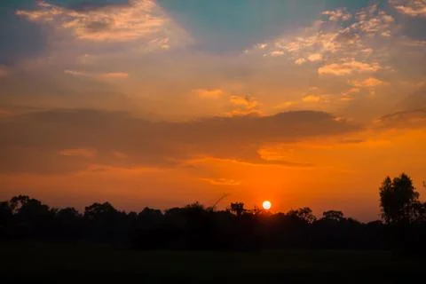 Sunset in the field Stock Photos