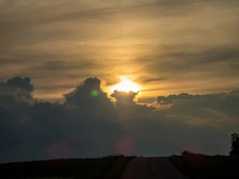 Sunset at a field Stock Photos