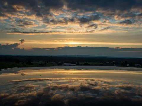 Sunset at a field Stock Photos