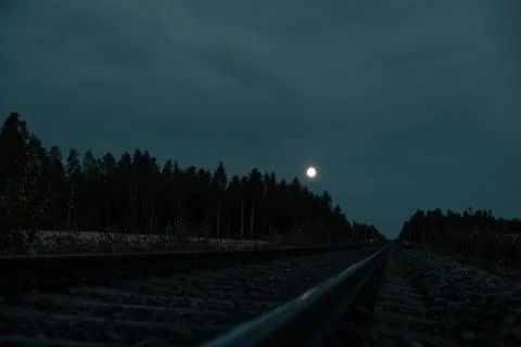 Sunset, field, train rails Foto stock