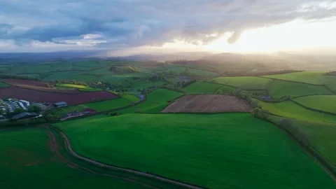 Sunset of Fields and Farms over Torquay from a drone, Devon, England, Europe Stock-Footage 274715564