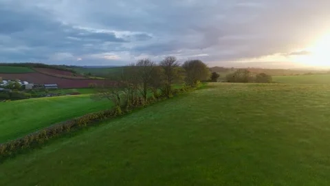 Sunset of Fields and Farms over Torquay from a drone,, Devon, England Видео 274716008