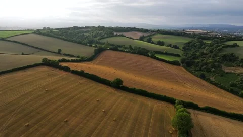 Sunset of Fields and Farms over Devon from a drone, Torquay, Torbay, Devon, UK Vidéo 314971298