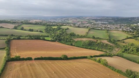 Sunset of Fields and Farms over Devon from a drone, Torquay, Torbay, Devon, UK Vidéo 314971300