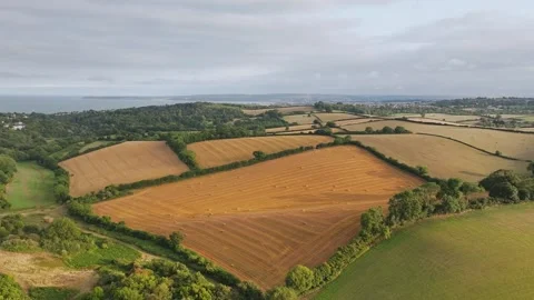 Sunset of Fields and Farms over Devon from a drone, Torquay, Torbay, Devon, UK Vidéo 314971306