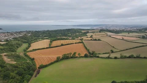 Sunset of Fields and Farms over Devon from a drone, Torquay, Torbay, Devon, UK Vidéo 314988626