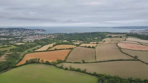 Sunset of Fields and Farms over Devon from a drone, Torquay, Torbay, Devon, UK Vidéo 314988637