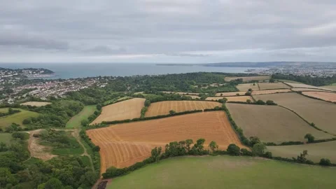 Sunset of Fields and Farms over Devon from a drone, Torquay, Torbay, Devon, UK Vidéo 314988663