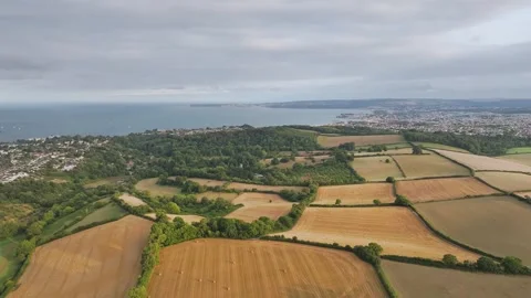 Sunset of Fields and Farms over Devon from a drone, Torquay, Torbay, Devon, UK Vidéo 314988774
