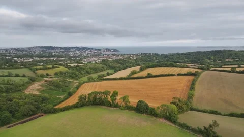 Sunset of Fields and Farms over Devon from a drone, Torquay, Torbay, Devon, UK Vidéo 314988809